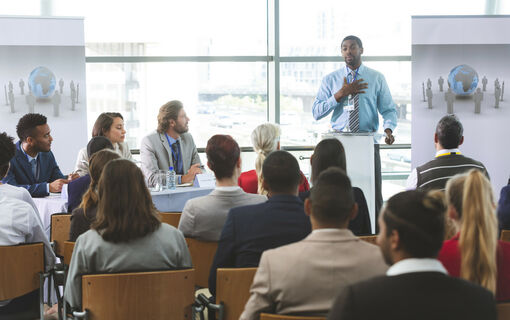 Male speaker speaks in a business seminar